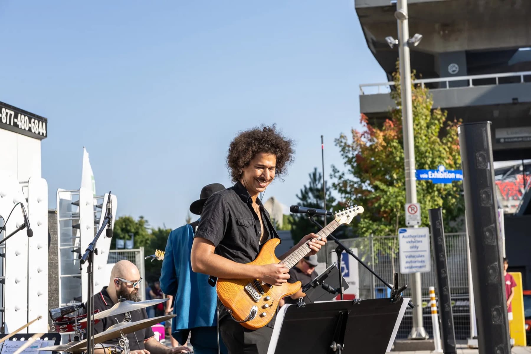 Almyr Jules and band performing live at City Folk Fest