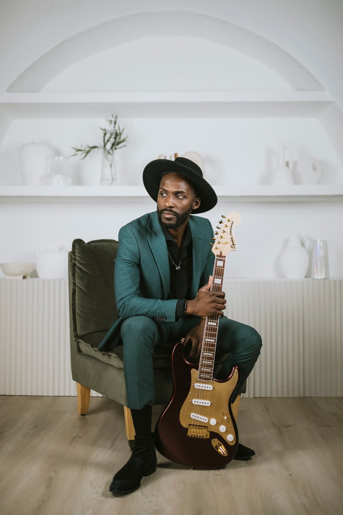 Almyr Jules portrait with guitar